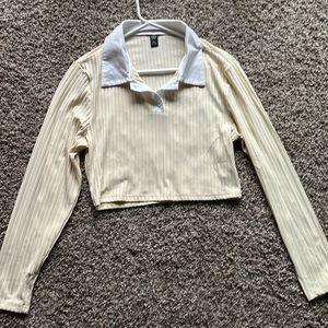 Never worn light yellow, long sleeve collared, crop top from SHEIN.